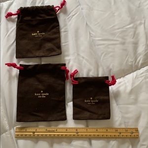 3 small Kate Spade jewelry bags, new condition